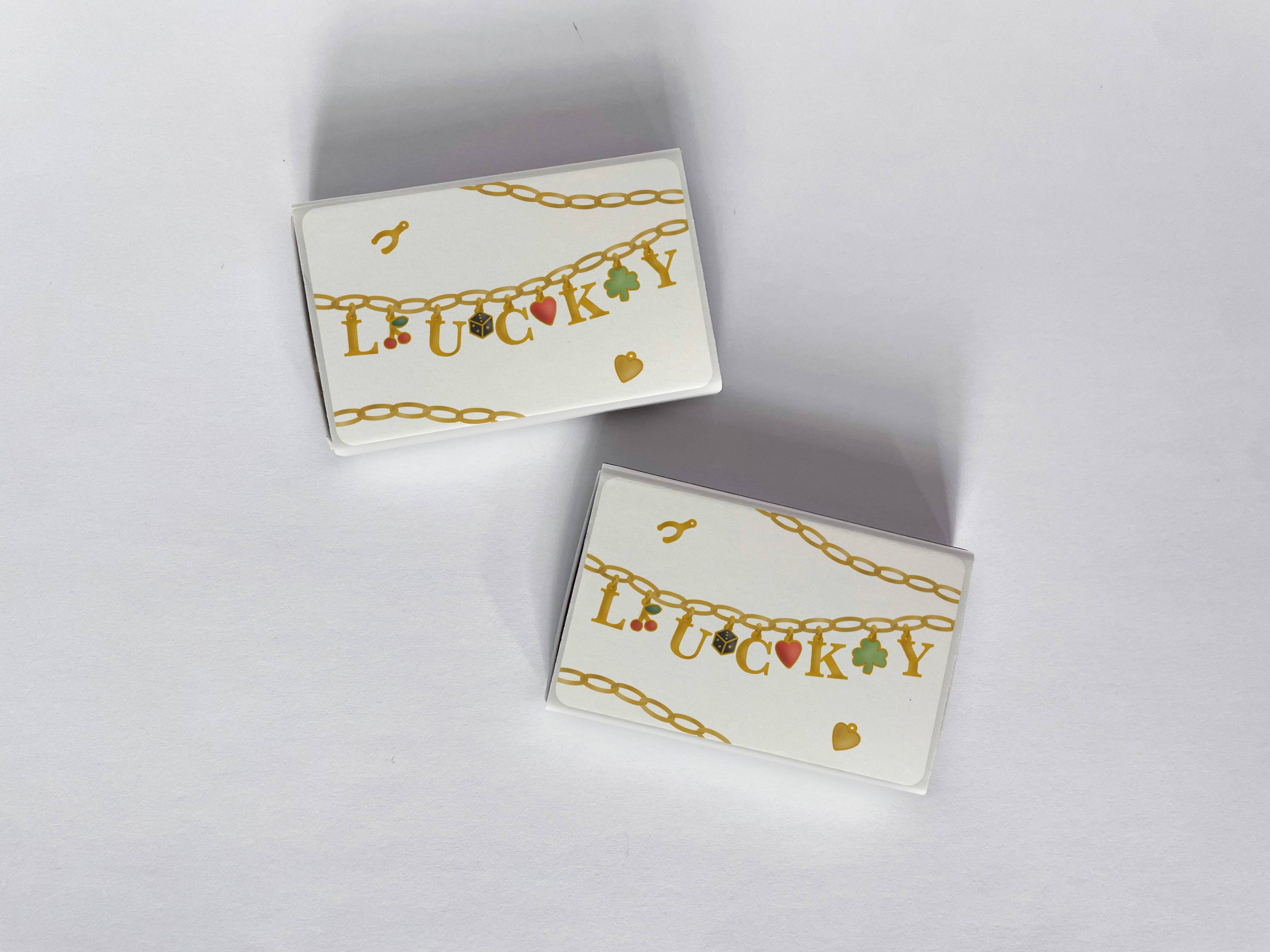 Lucky Charms Gold Charm Bracelet Matchbook